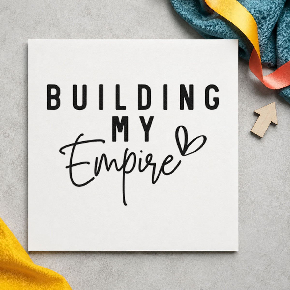 Building My Empire Heart craft stamp imprint in black ink on a handmade project, one idea being closing gift tags.