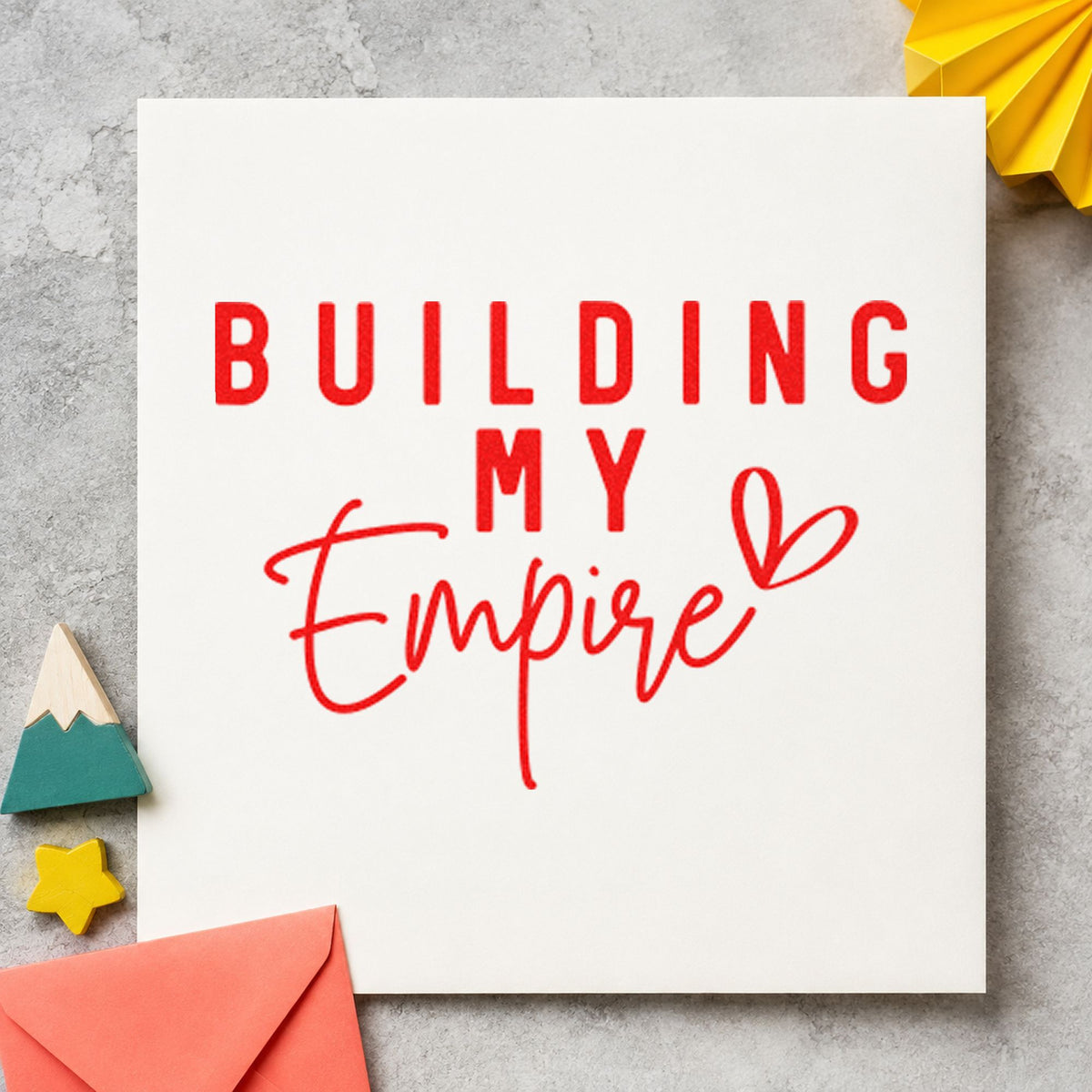 Building My Empire Heart craft stamp imprint in red ink on a handmade project, one idea being open house cards.