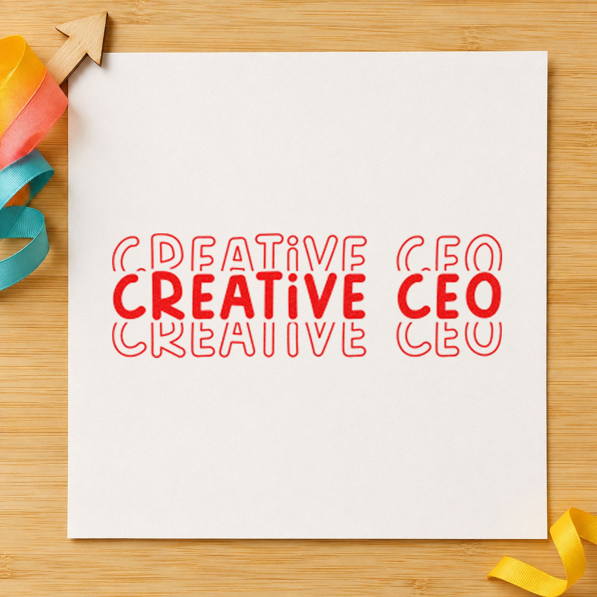 Creative CEO Repeated Lettering craft stamp imprint in red ink on a handmade project, one idea being order slip cards.