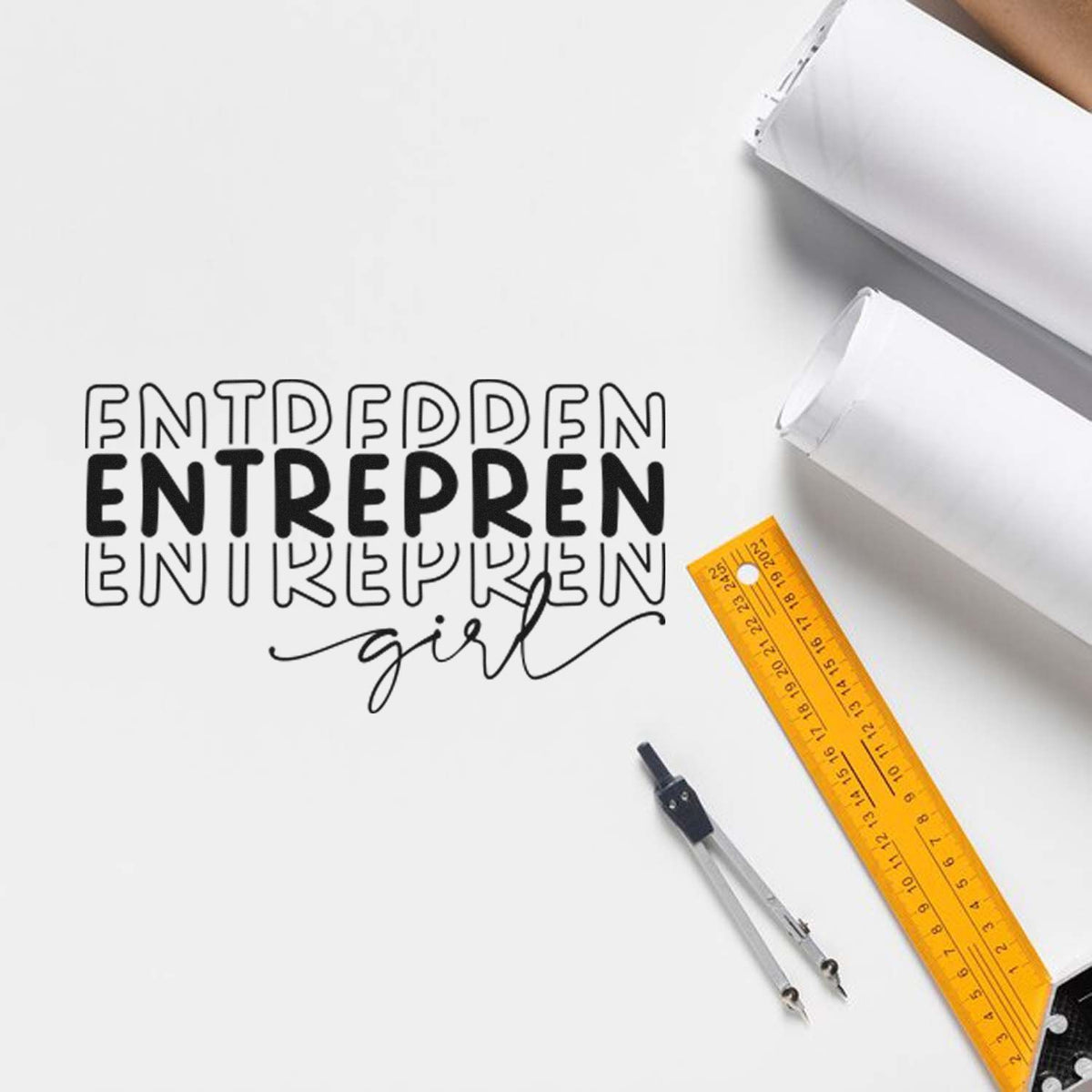 Black custom stamp and seal design on white paper, with orange ruler and drafting compass.