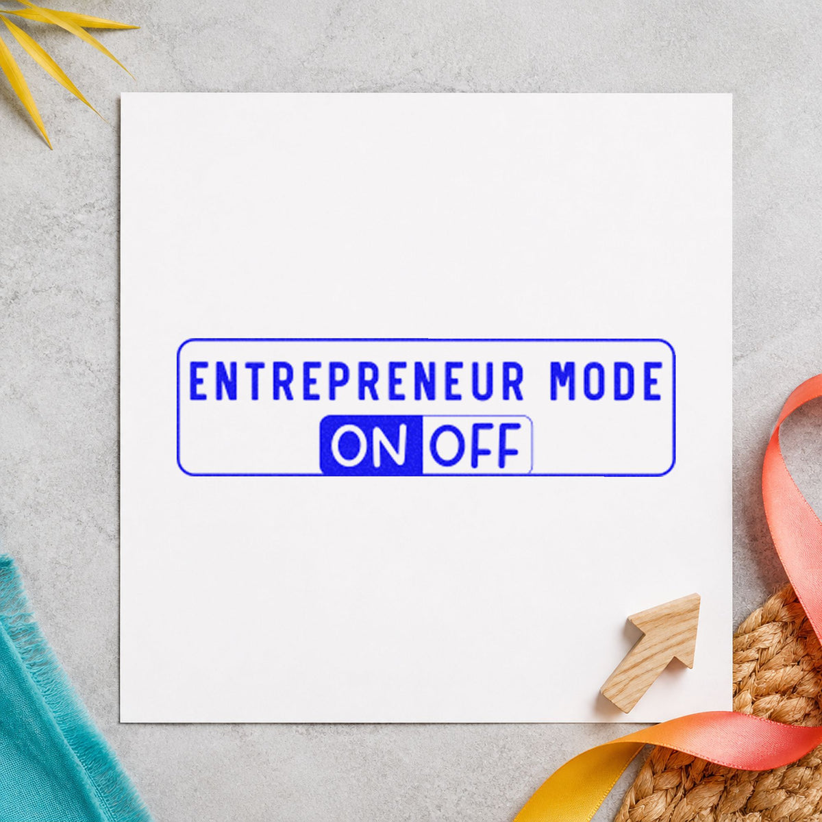 Entrepreneur Mode On Off craft stamp imprinted in blue ink on paper, a design suited to framed office door.