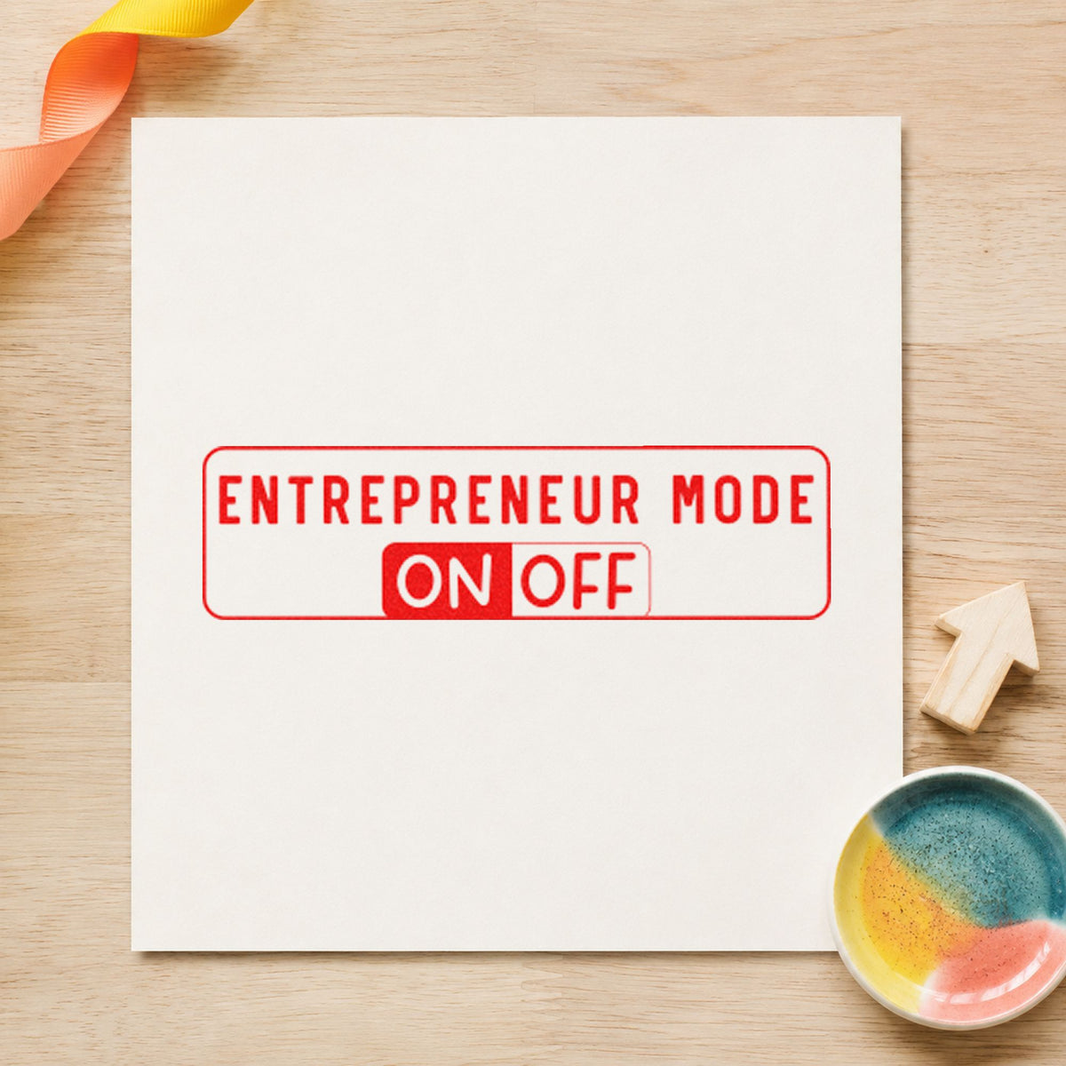 Entrepreneur Mode On Off craft stamp imprint in red ink on a handmade project, one idea being day close cards.