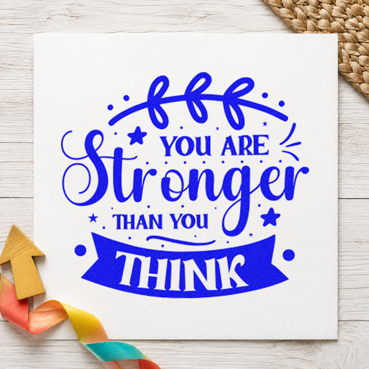 You Are Stronger Think Banner craft stamp in blue ink on cardstock, an easy option for lead sleeve printing.