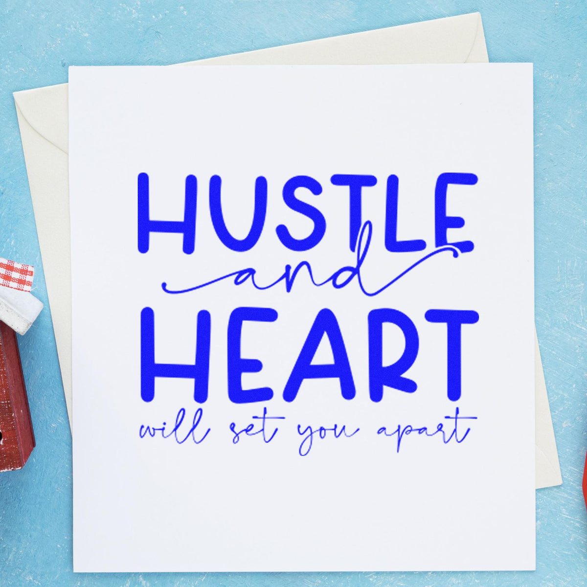 Hustle Heart Set You Apart rubber stamp shown in blue ink, stamped for projects such as event album page.