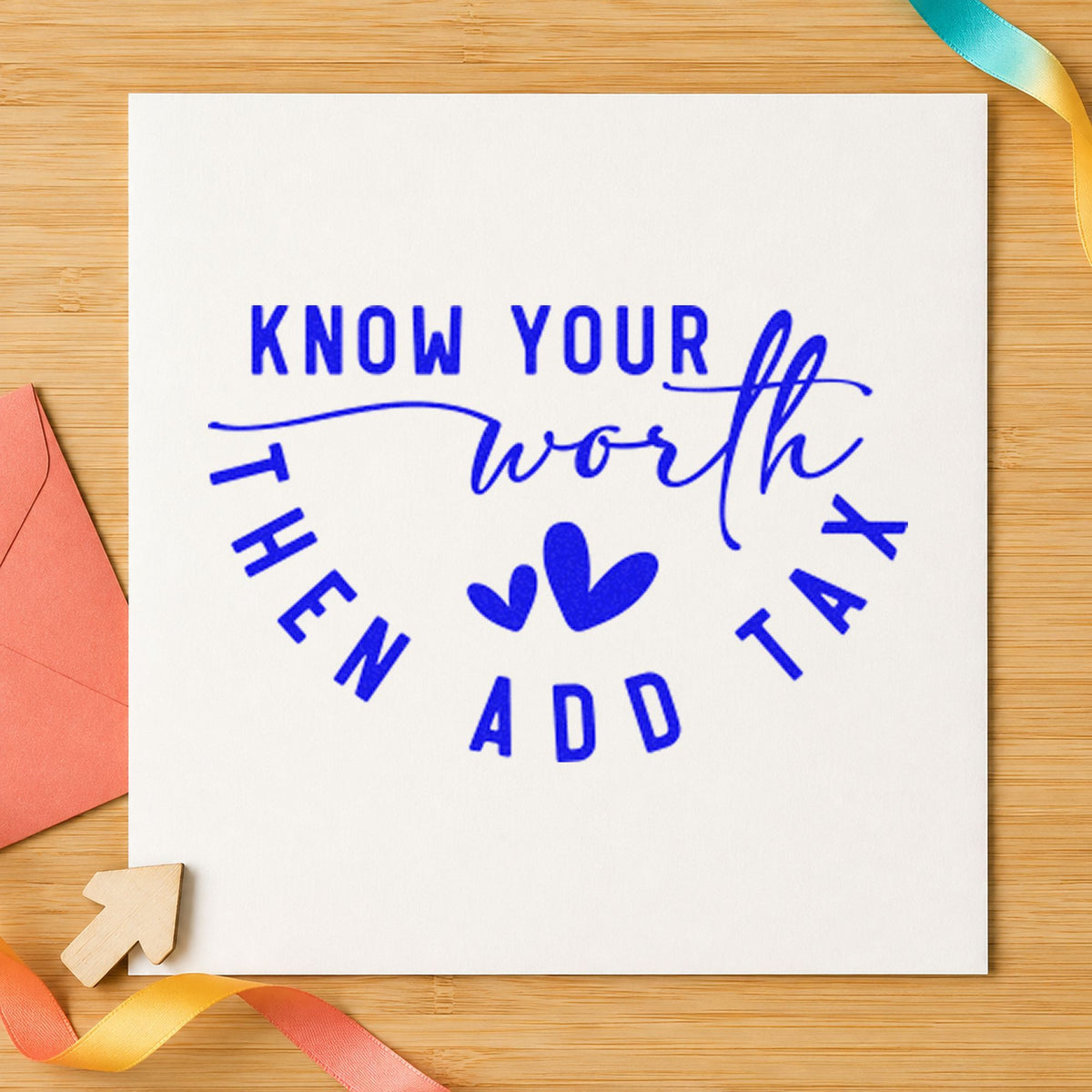 Know Your Worth Add Tax craft stamp in blue ink on cardstock, an easy option for sorting bin printing.