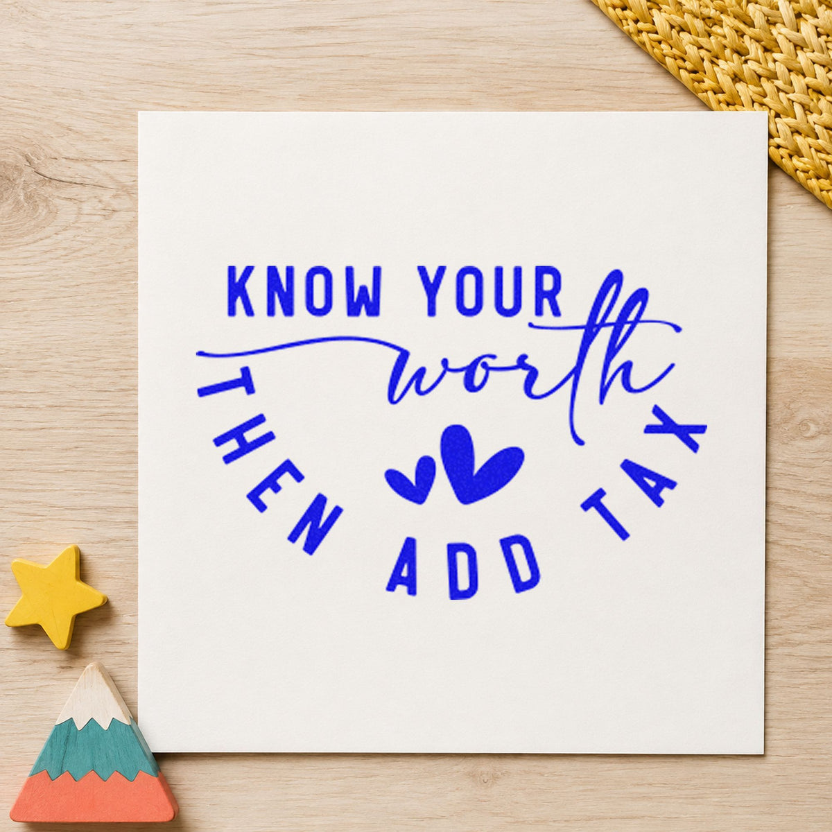 Know Your Worth Add Tax craft stamp imprinted in blue ink on paper, a design suited to framed sorting room.
