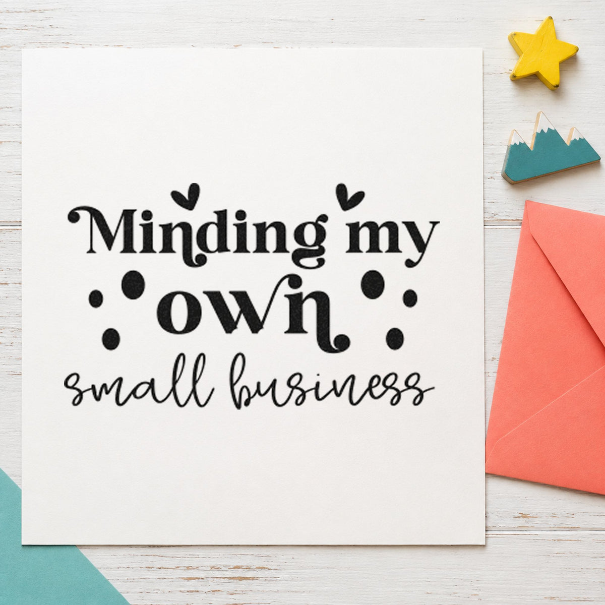 Minding My Own Small Business craft stamp imprint in black ink on a handmade project, one idea being treat bag gift tags.