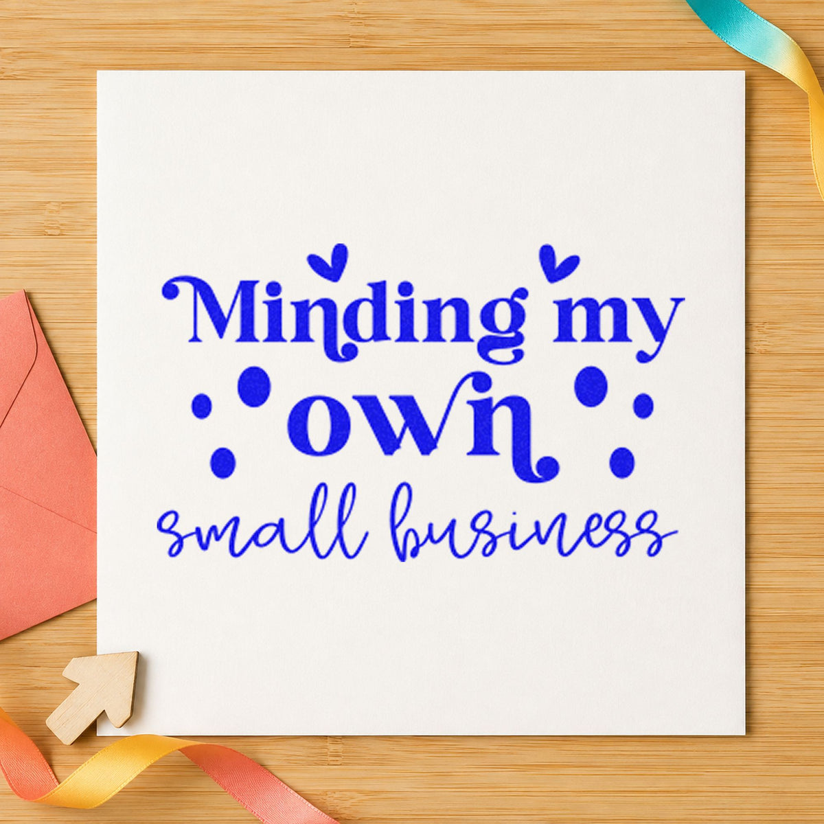 Minding My Own Small Business craft stamp imprinted in blue ink on paper, a design suited to framed kitchen nook.