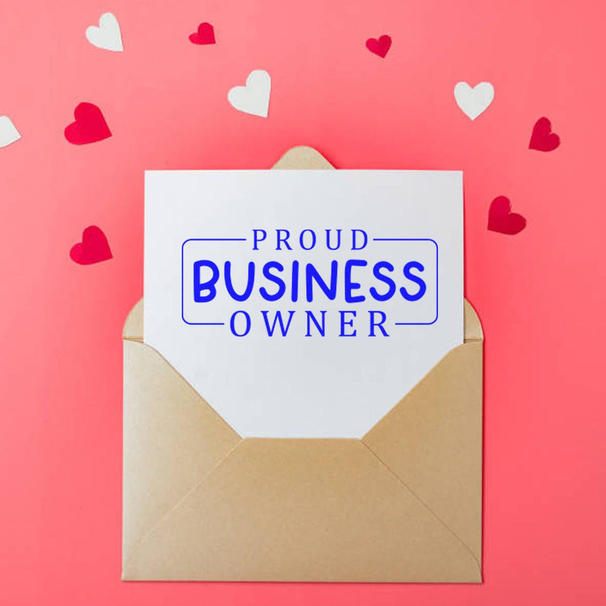 Blue Proud Business Owner stamp and seal on white card in tan envelope, with pink and white hearts on coral background.