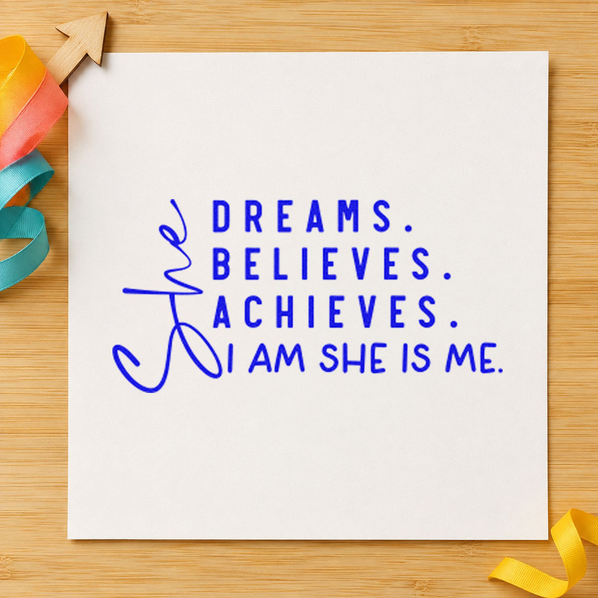 She Dreams Believes Achieves craft stamp in blue ink on cardstock, an easy option for wrap cloth printing.