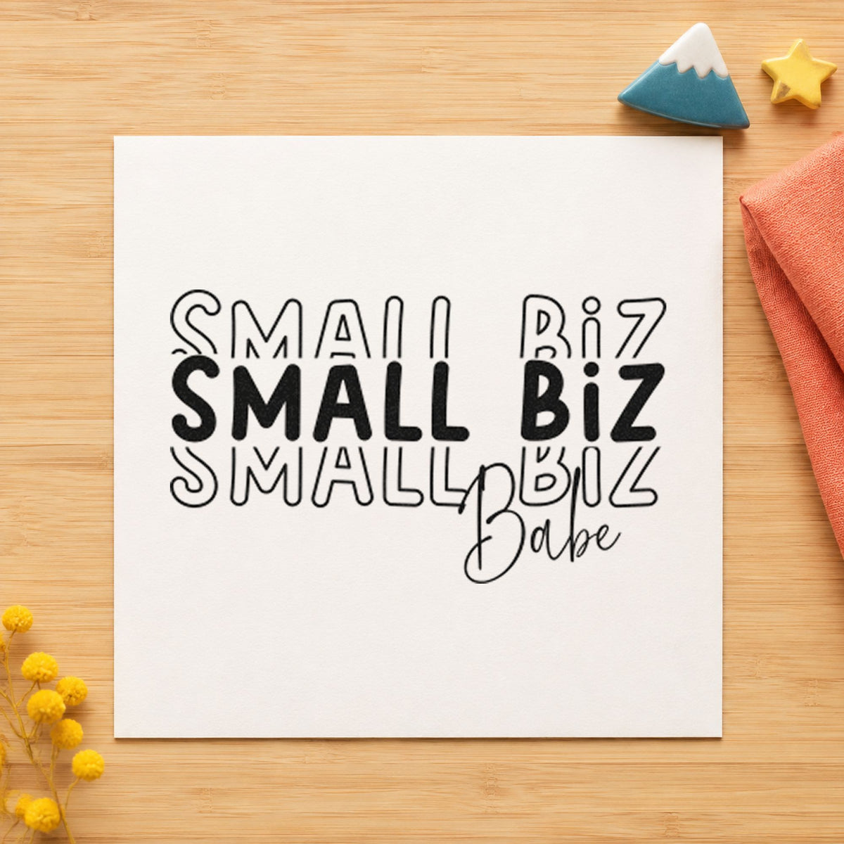 Small Biz Babe Repeated craft stamp in black ink on cardstock, an easy option for maker album page.