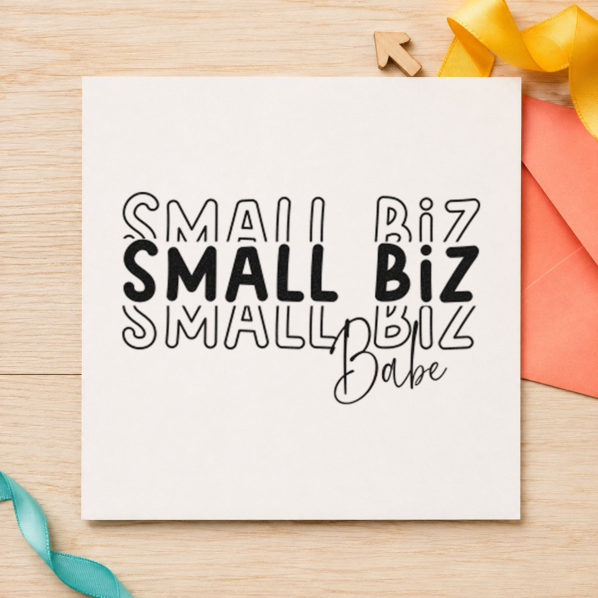 Small Biz Babe Repeated craft stamp imprint in black ink on a handmade project, one idea being jewelry box gift tags.