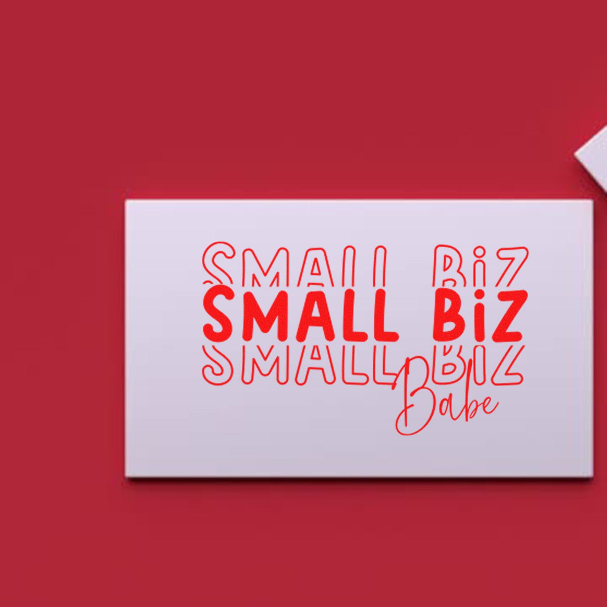 Custom stamp and seal on white card with red SMALL BIZ lettering against a deep red background.