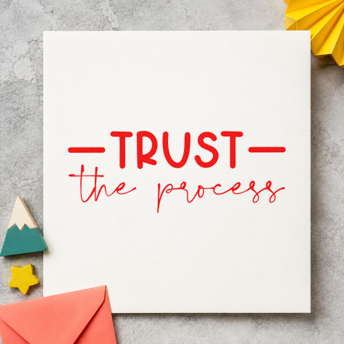 Trust The Process Script craft stamp imprint in red ink on a handmade project, one idea being care guide cards.