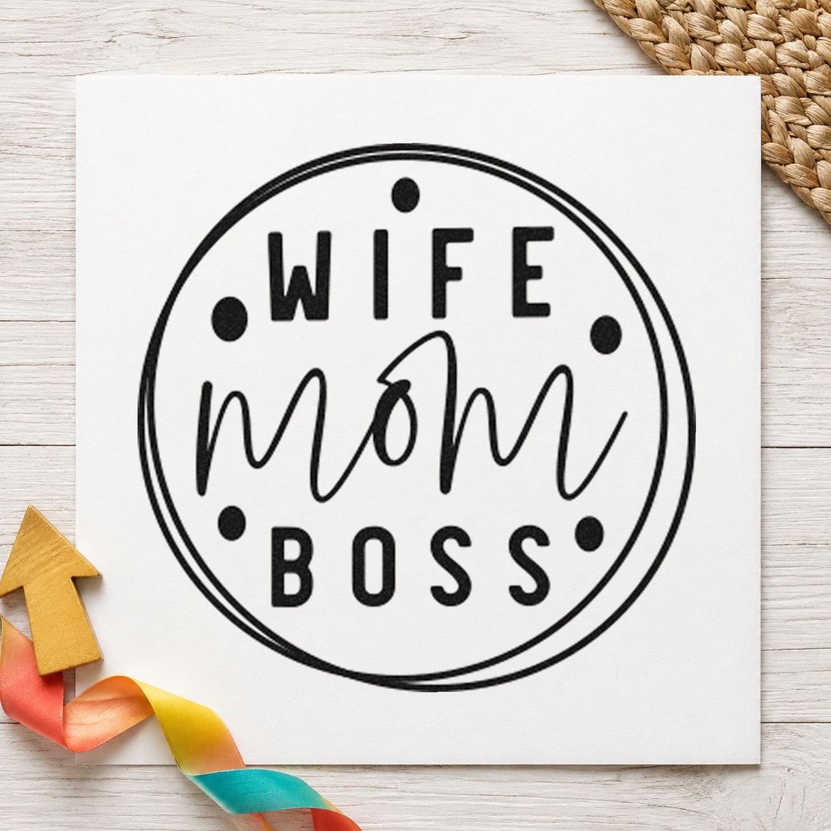 Wife Mom Boss Circle craft stamp imprint in black ink on a handmade project, one idea being paper set gift tags.