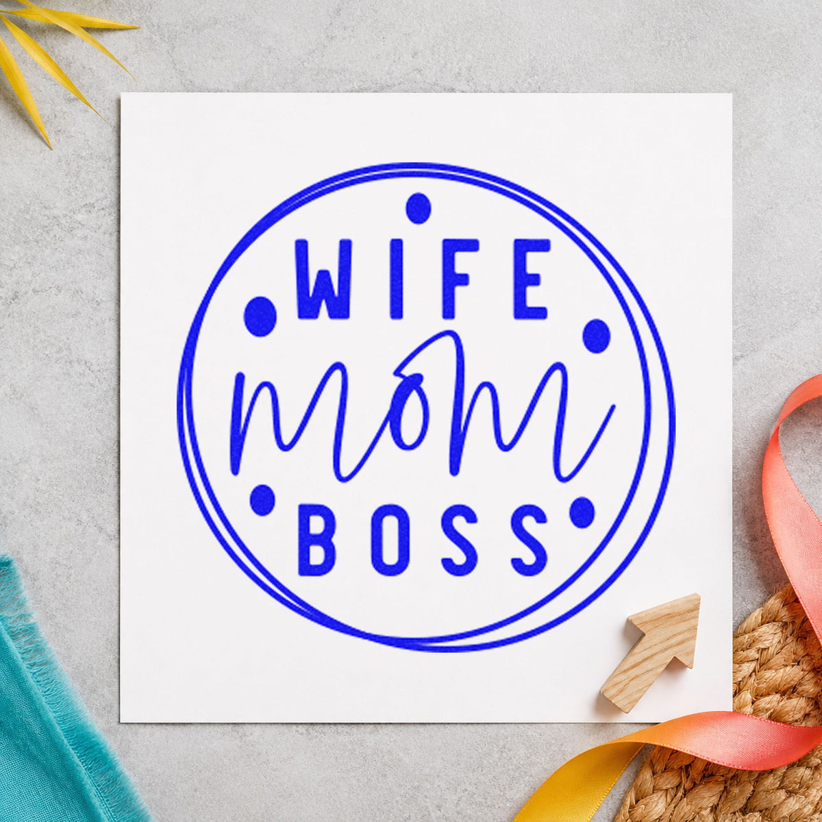 Wife Mom Boss Circle craft stamp in blue ink on cardstock, an easy option for wrap ribbon printing.