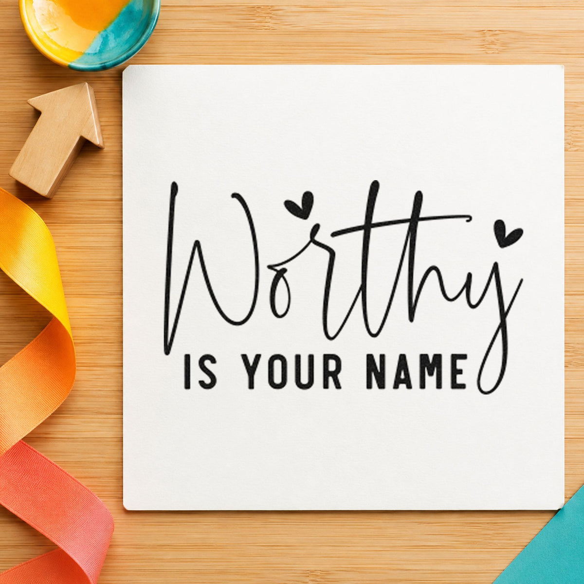 Worthy Is Your Name craft stamp imprint in black ink on a handmade project, one idea being gift wrap tags.