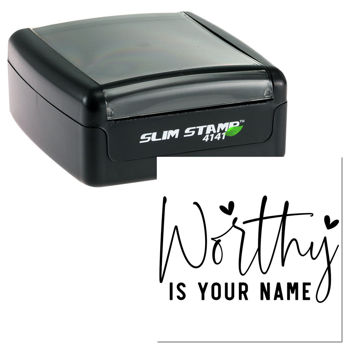 Black self-inking stamp and seal with clear lid, displaying script text Worthy is your name on white.