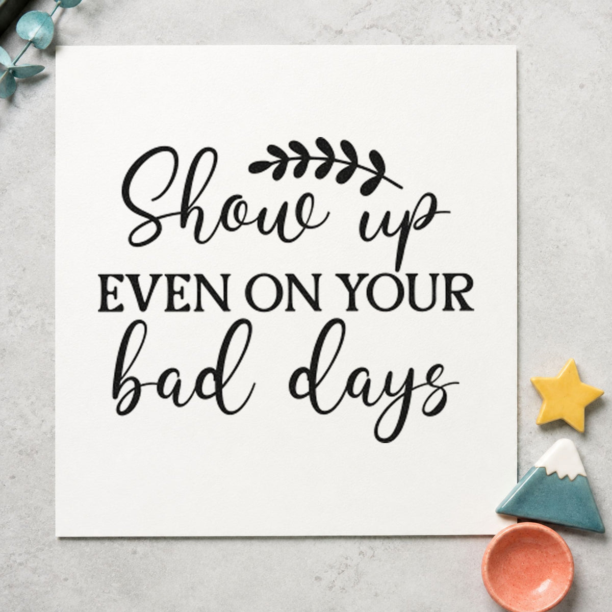 Show Up On Bad Days craft stamp imprint in black ink on a handmade project, one idea being pencil set gift tags.