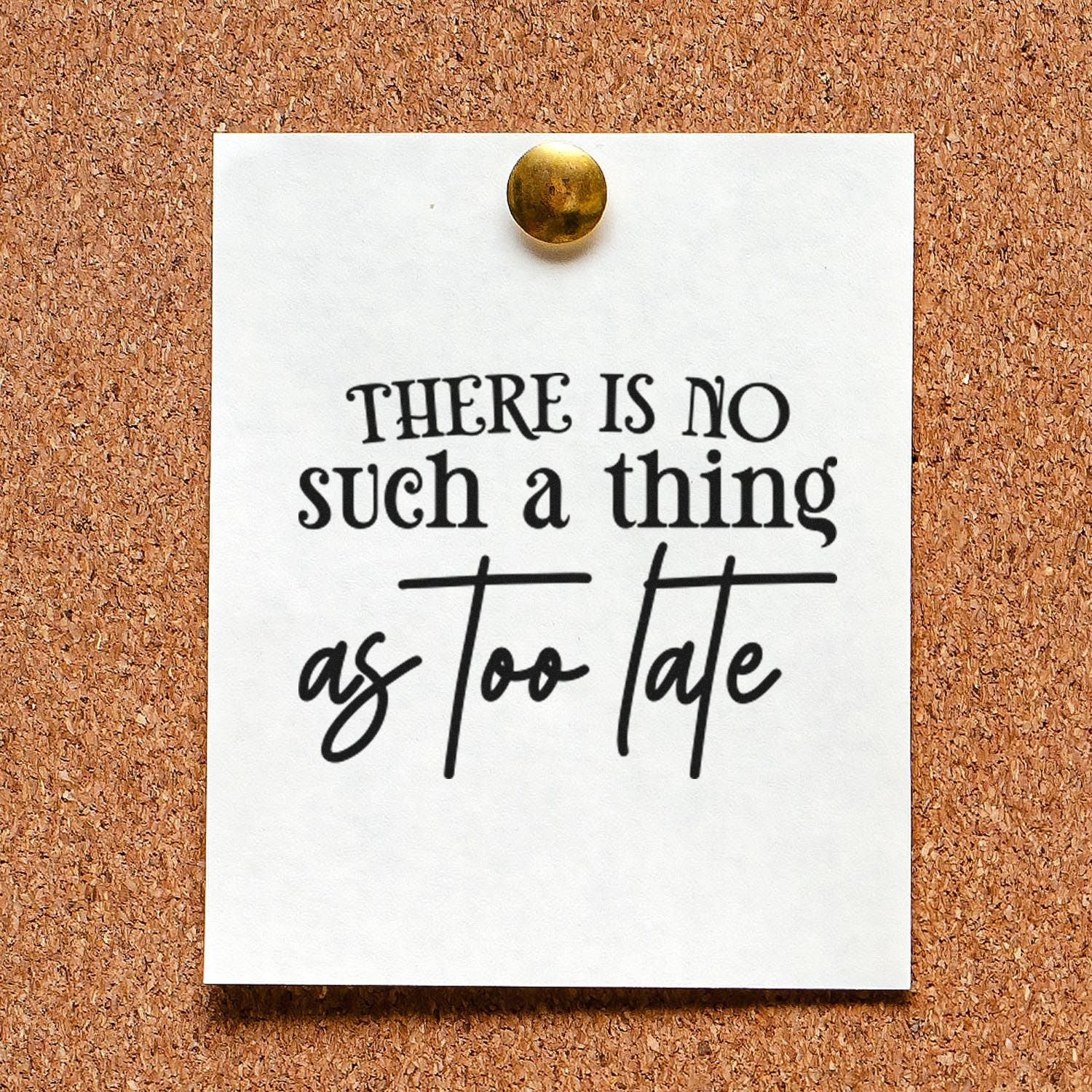 White stamp sample card with black There is no such a thing as too late text, pinned with brass seal on cork board.