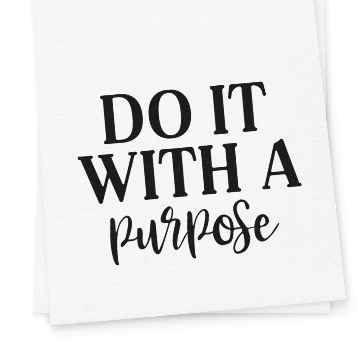 Black stamp seal reading DO IT WITH A purpose on white paper with bold serif and script lettering.