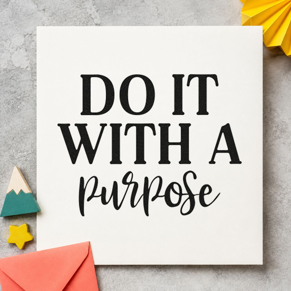 Do It With Purpose Script craft stamp imprint in black ink on a handmade project, one idea being set loan gift tags.