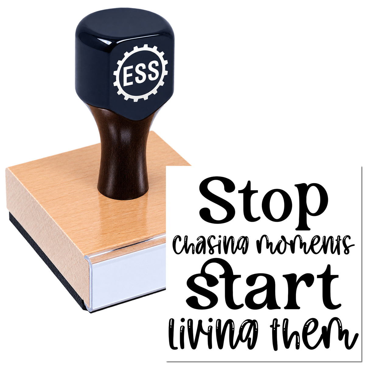 Navy ESS wax seal stamp on pink sealing block with "Stop chasing moments, start living them" text.