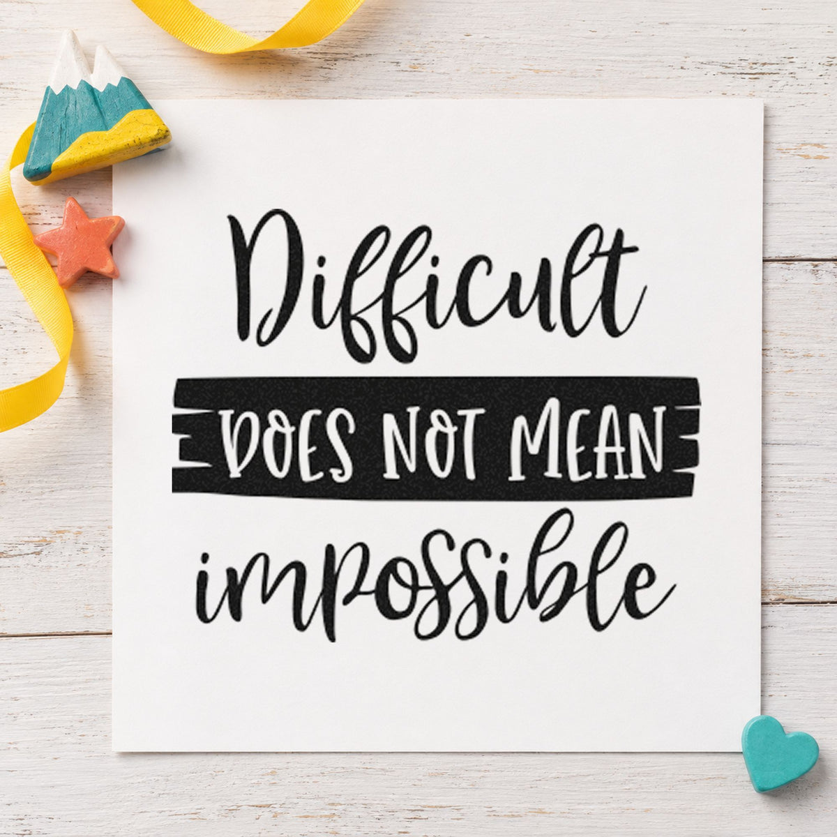 Difficult Does Not Mean Impossible craft stamp in black ink on cardstock, an easy option for puzzle album page.