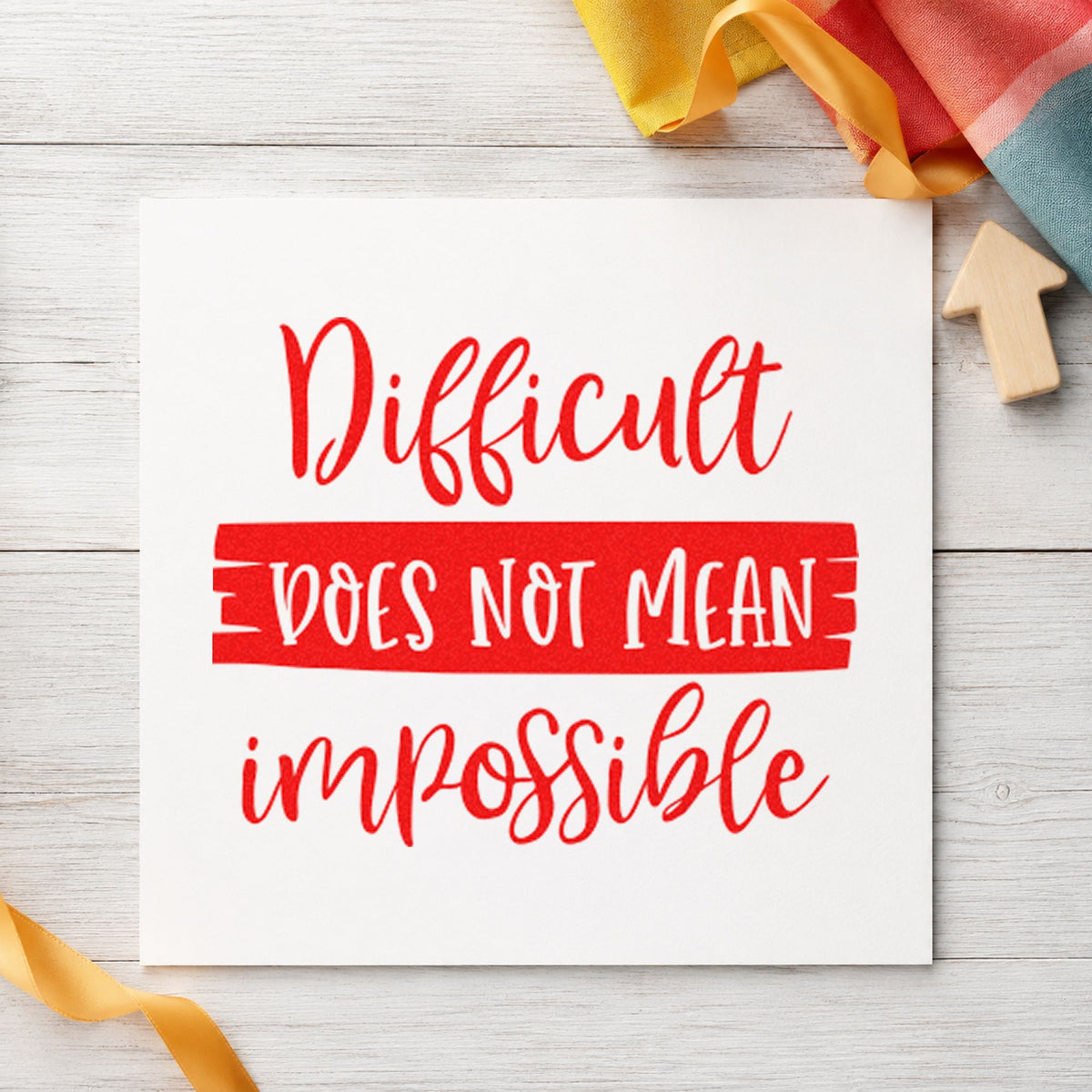 Difficult Does Not Mean Impossible rubber stamp shown in red ink, stamped for projects such as bin piece labels.