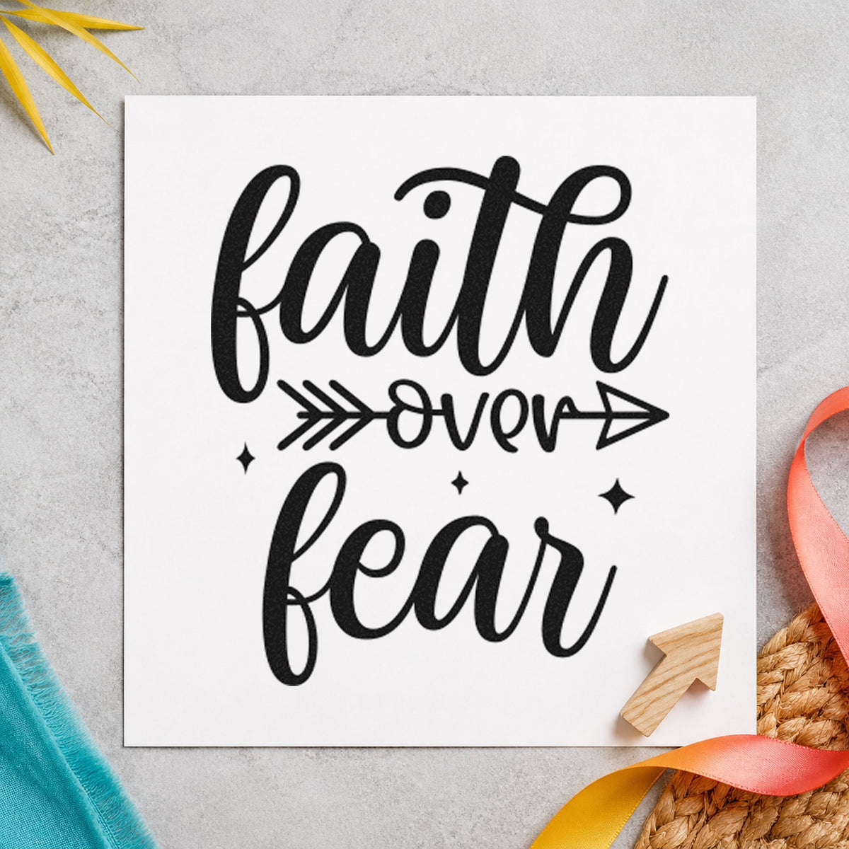 Faith Over Fear Arrow craft stamp imprint in black ink on a handmade project, one idea being supply duffel tags.