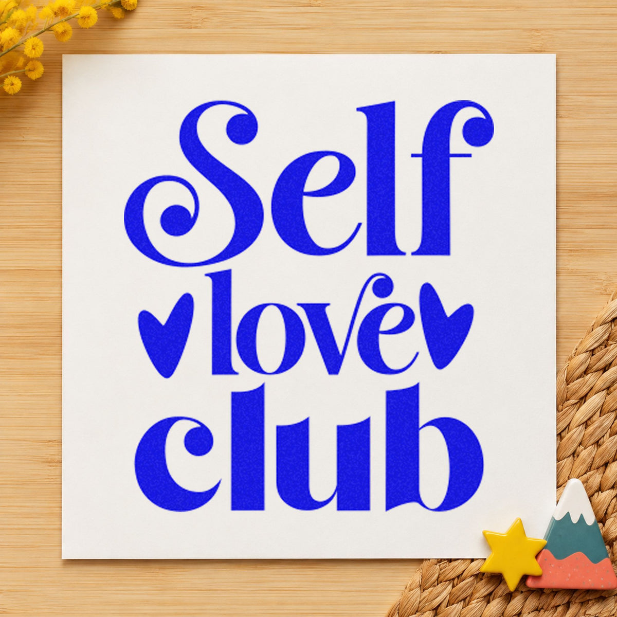 Self Love Club Hearts craft stamp imprinted in blue ink on paper, a design suited to framed bathroom shelf.