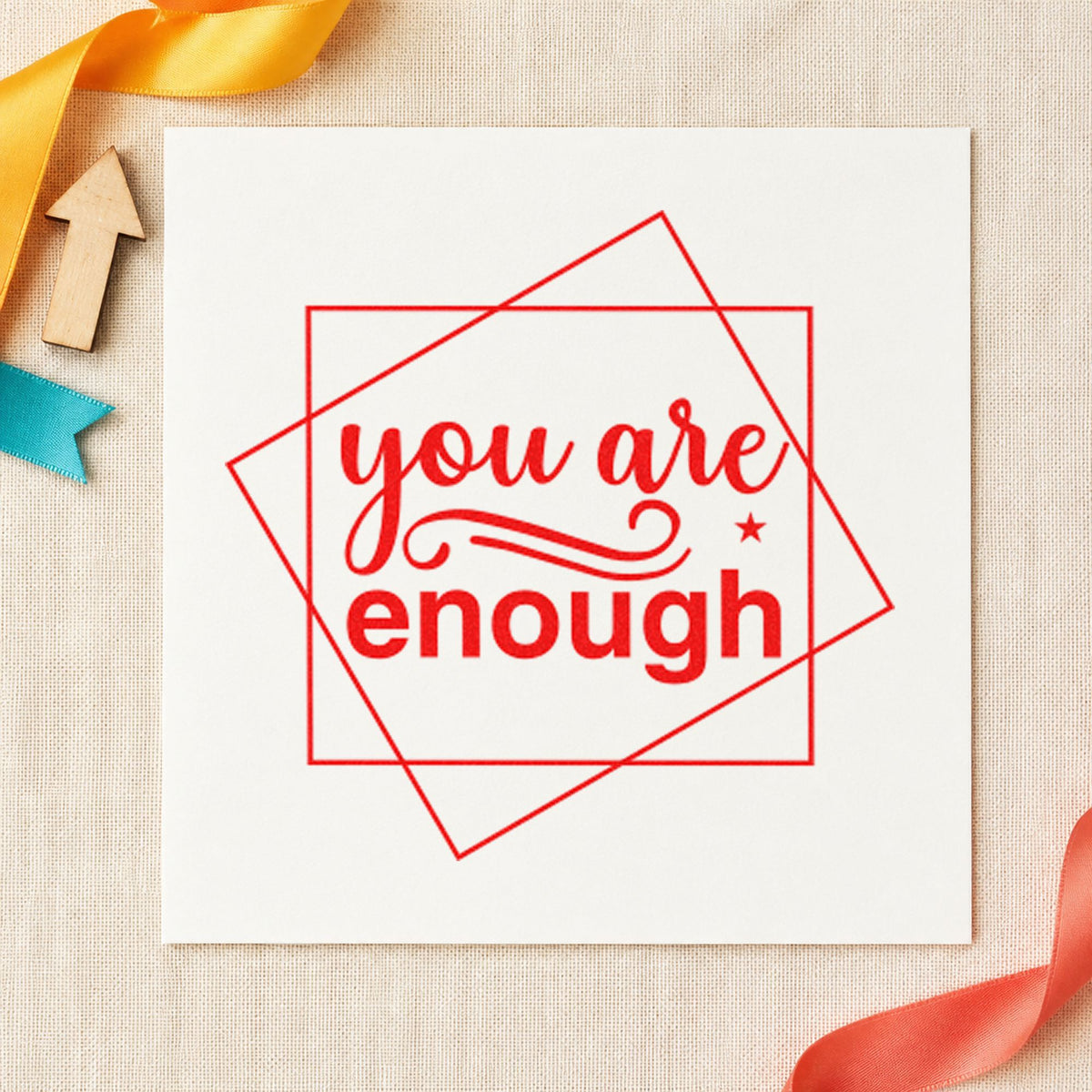 You Are Enough Overlapping Squares craft stamp imprint in red ink on a handmade project, one idea being address share cards.