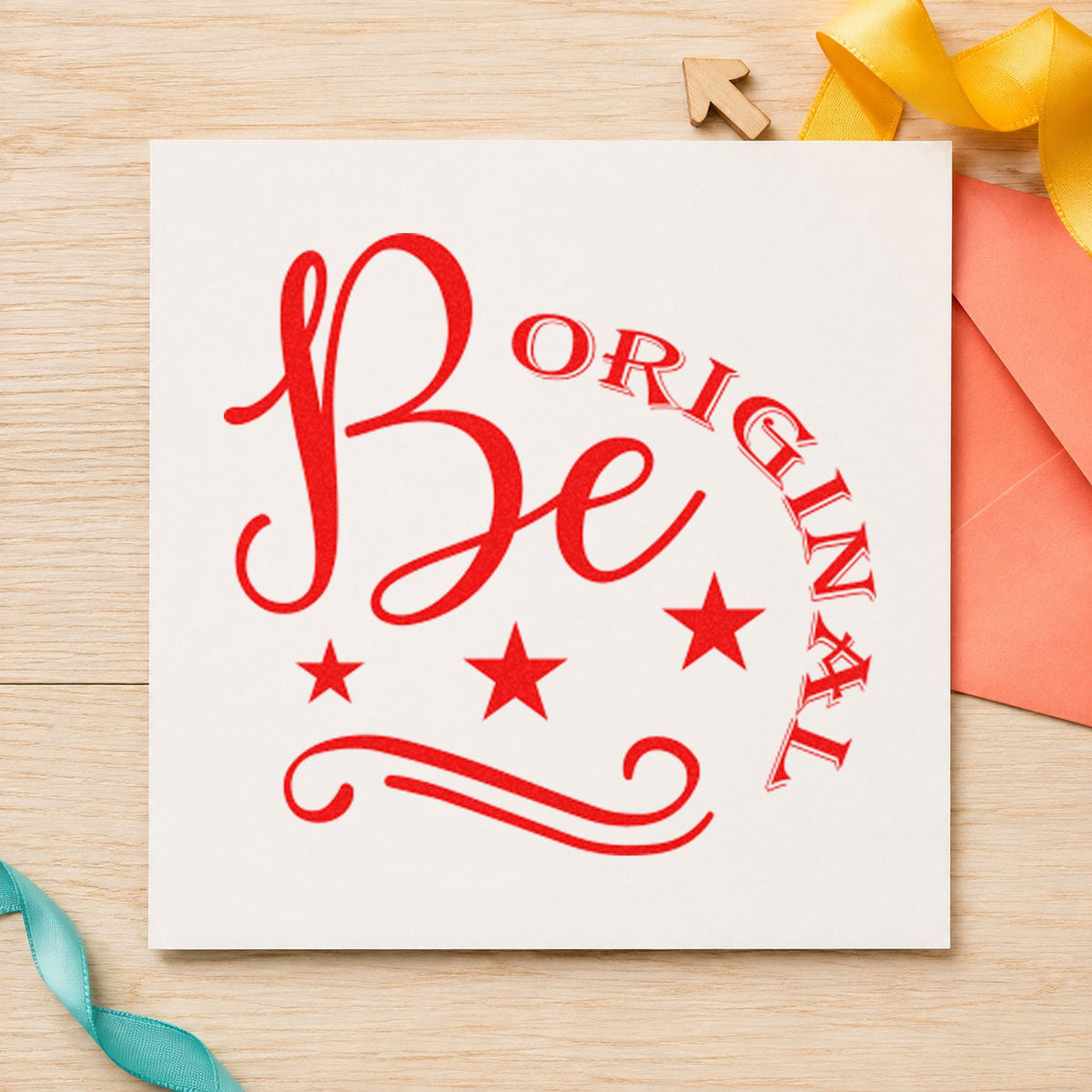 Be Original Stars Flourish craft stamp imprint in red ink on a handmade project, one idea being care note cards.