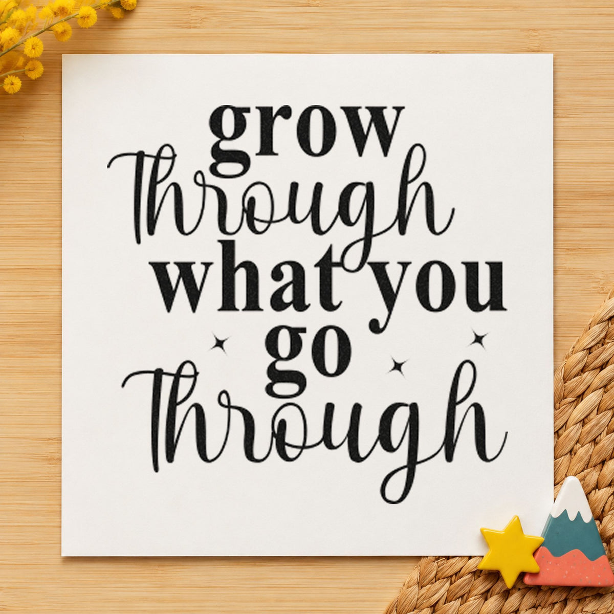 Grow Through What You Go craft stamp imprint in black ink on a handmade project, one idea being sapling gift tags.