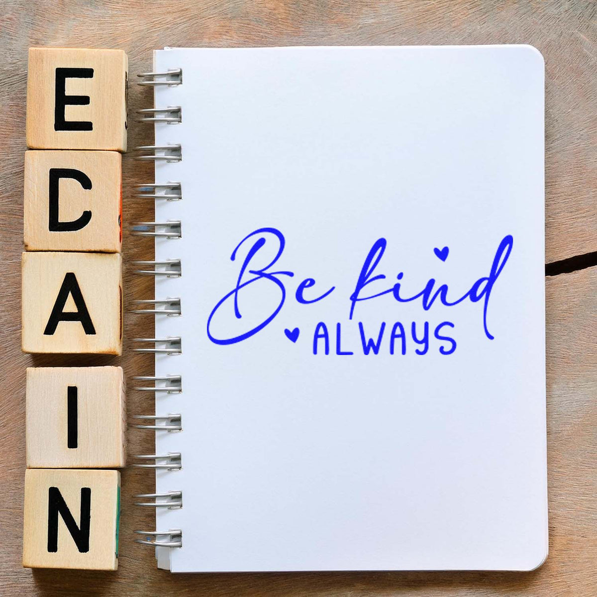 Be Kind Always Heart rubber stamp shown in blue ink, stamped for projects such as box year album page.