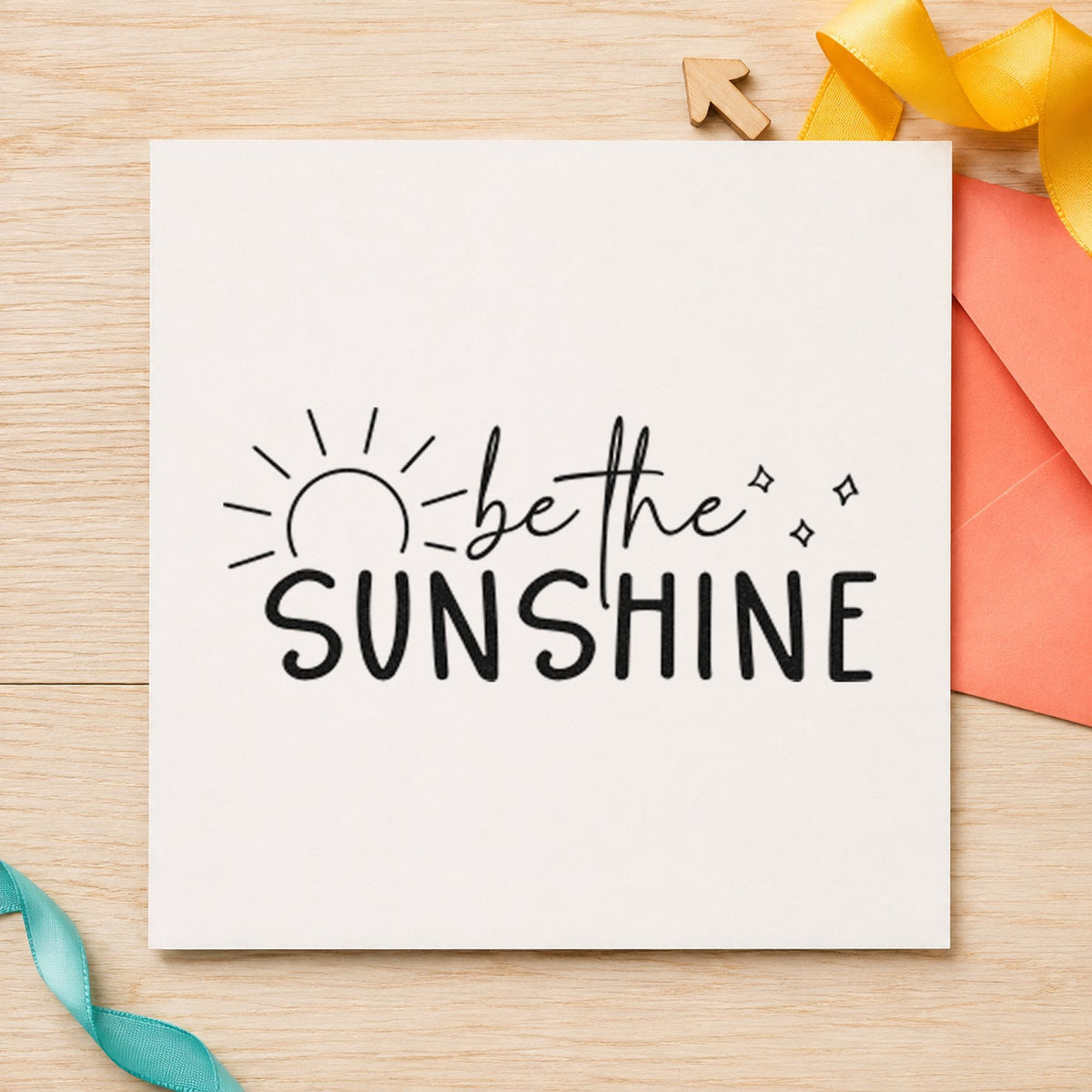 Be The Sunshine Sunrise craft stamp imprint in black ink on a handmade project, one idea being cup sleeve gift tags.