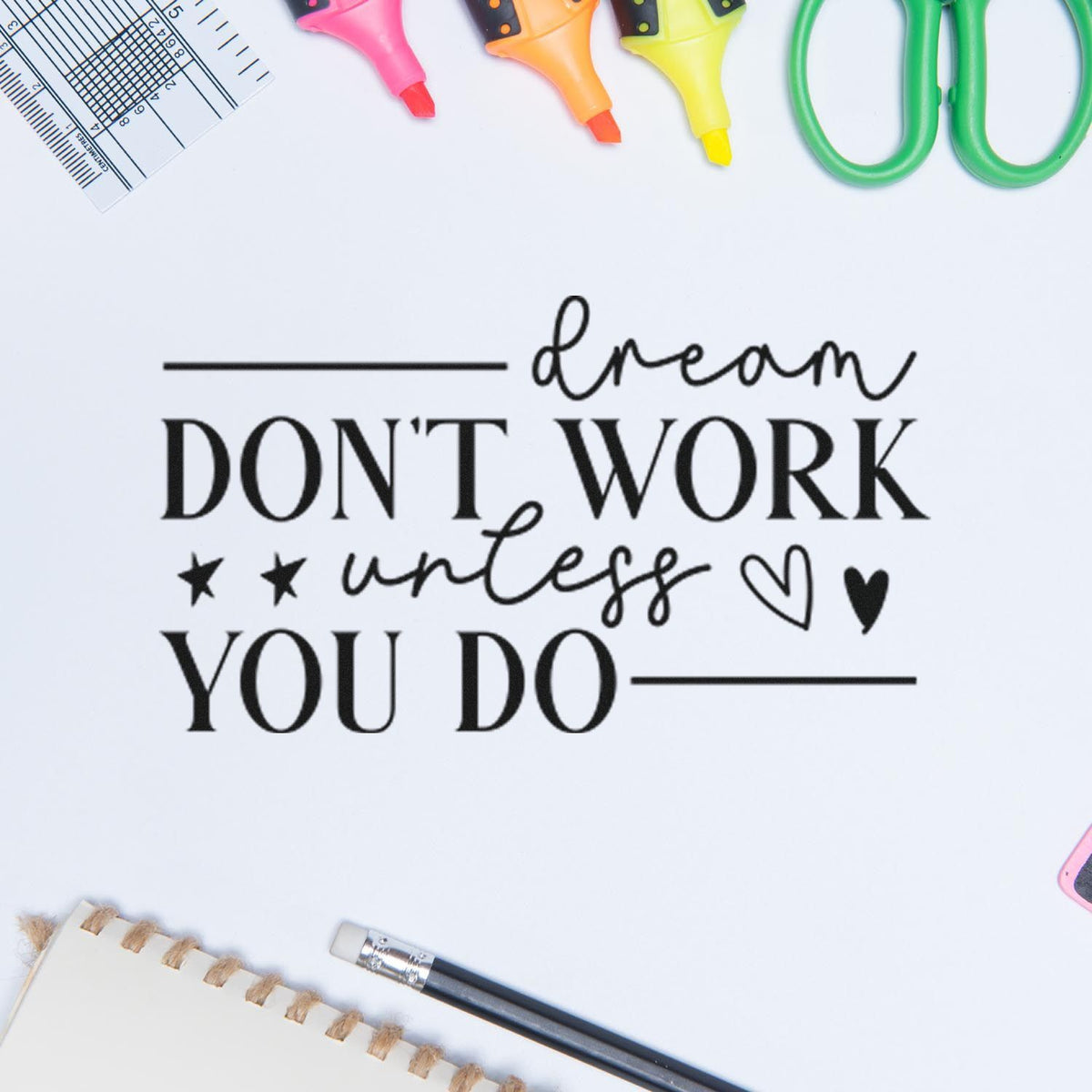 Black stamp design reading dream DONT WORK unless YOU DO, with pink, orange, yellow and green sealing tools.