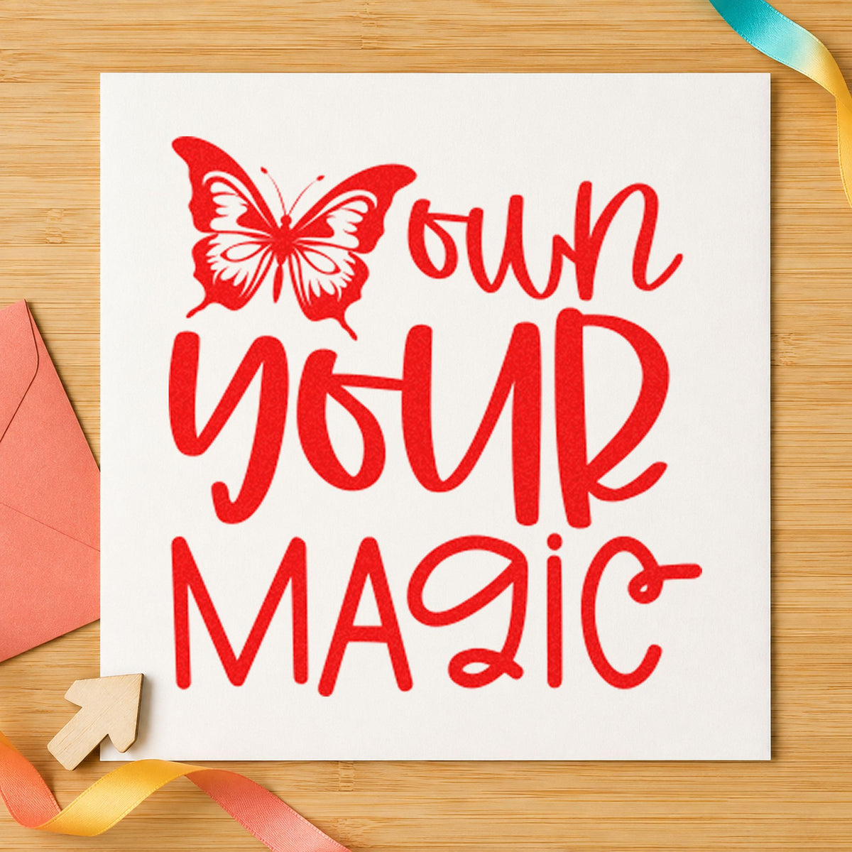 Own Your Magic Butterfly craft stamp imprint in red ink on a handmade project, one idea being design menu cards.