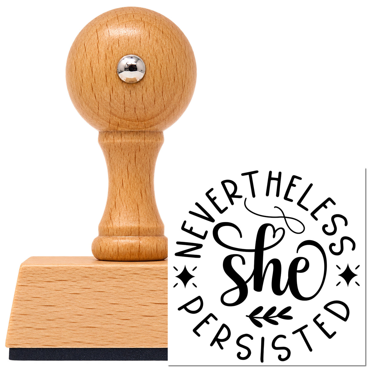 Vintage Pro beech wood stamp with a round knob handle, shown with its black Nevertheless She Persisted imprint on white.