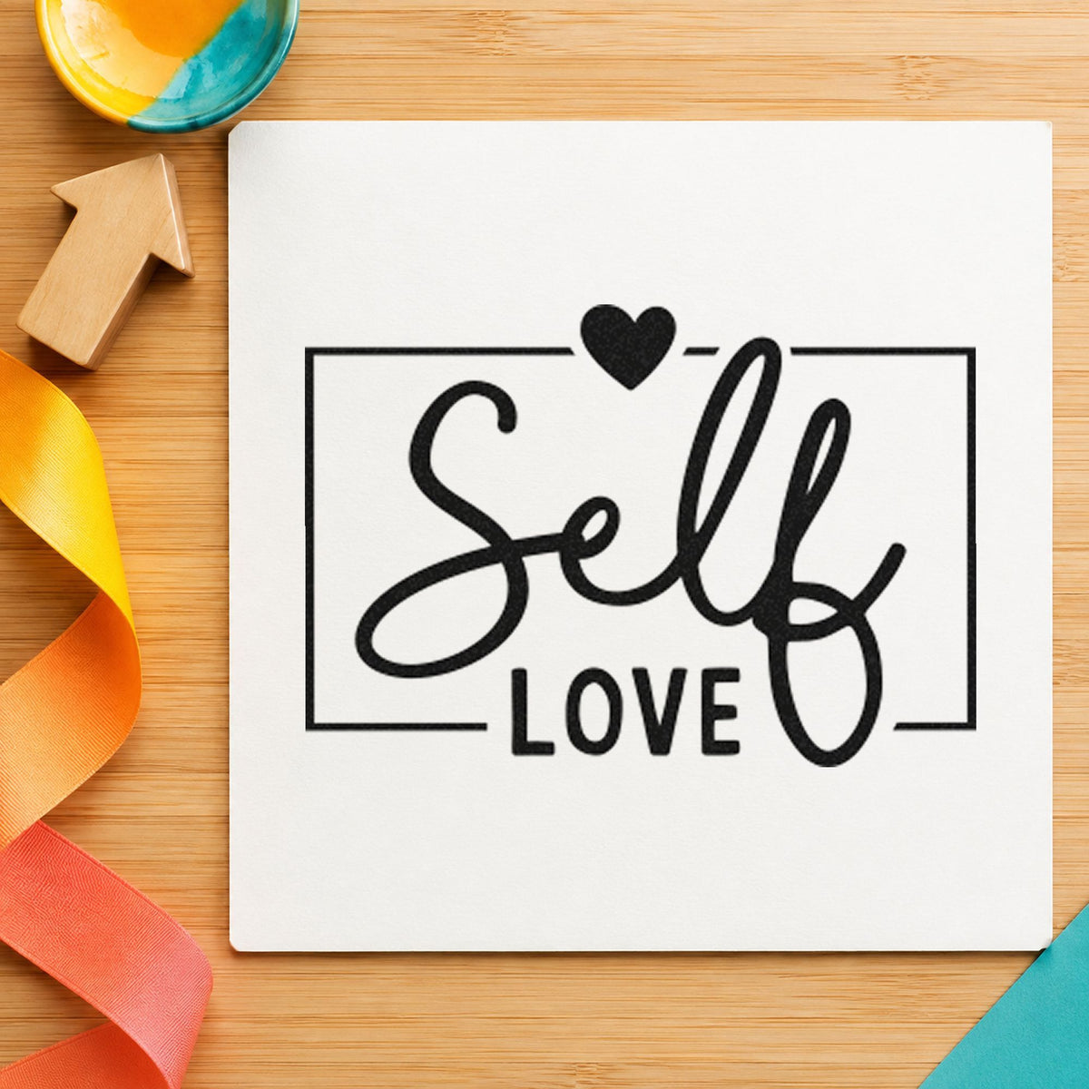 Self Love Framed Heart craft stamp in black ink on cardstock, an easy option for practice album page.