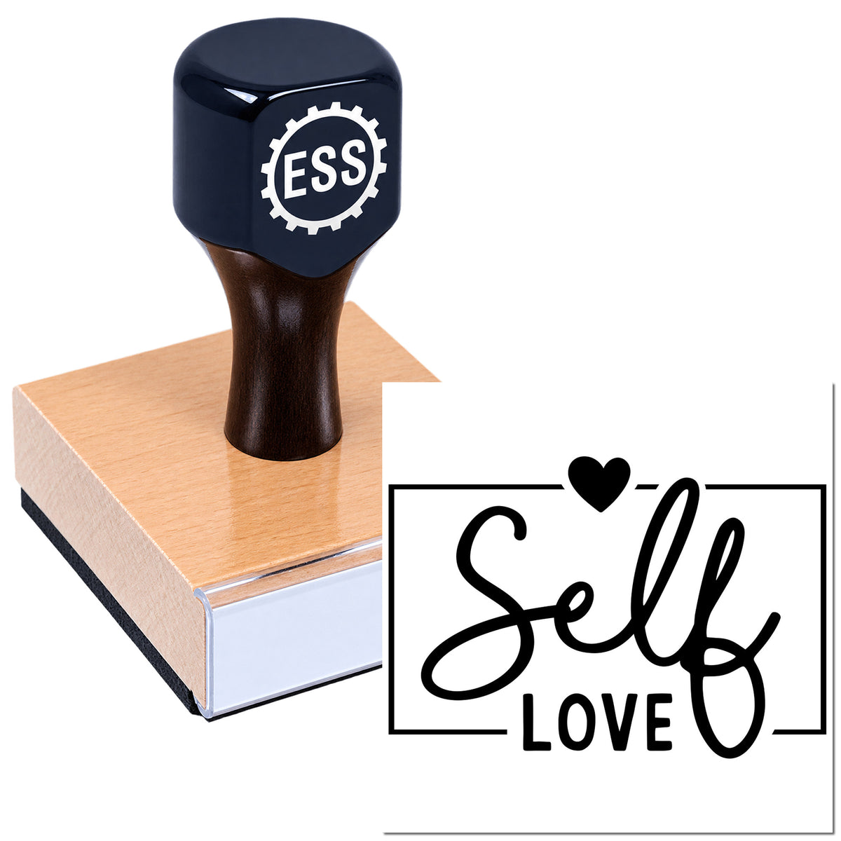 Black ESS rubber stamp on wood block, showing a black "Self Love" seal with heart icon and script text.