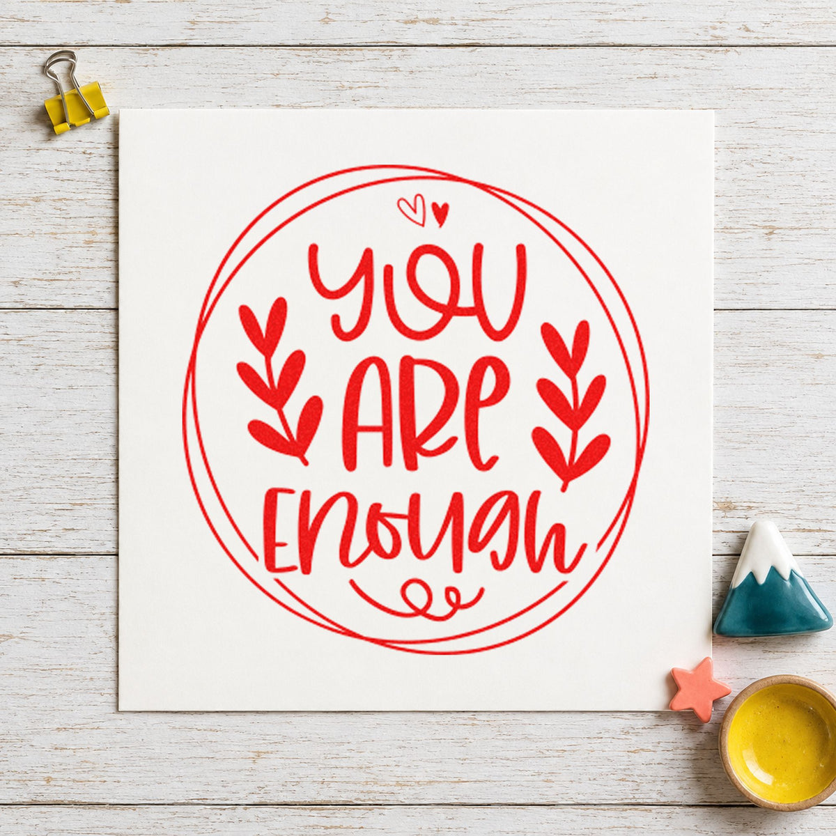 You Are Enough Circle Leaves craft stamp imprint in red ink on a handmade project, one idea being home call cards.