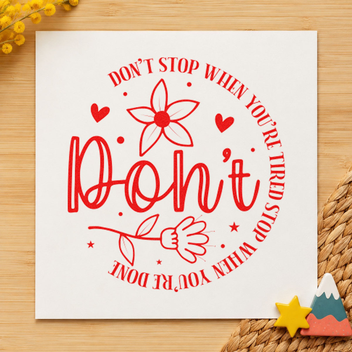 Don't Stop When Tired Floral rubber stamp shown in red ink, stamped for projects such as box source labels.