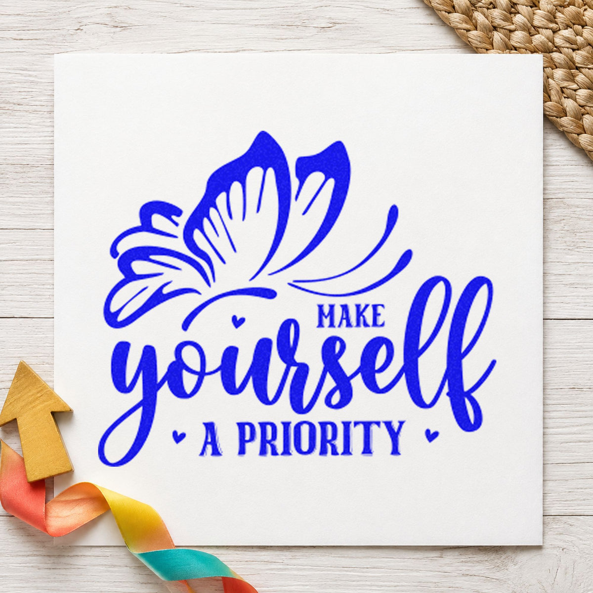 Make Yourself A Priority Butterfly craft stamp in blue ink on cardstock, an easy option for walk cap printing.