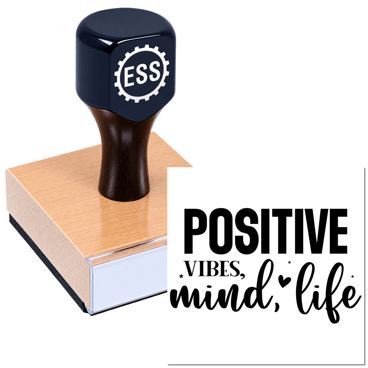 Black ESS rubber stamp on copper seal block with "POSITIVE VIBES, mind, life" text on a white background.