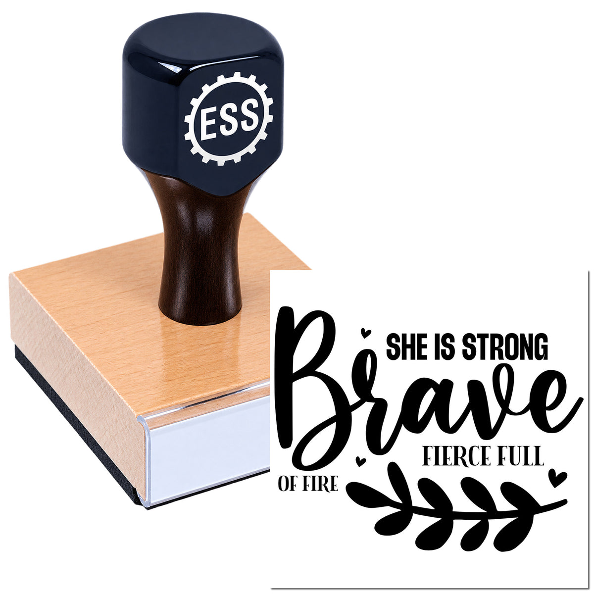 Black ESS rubber stamp on a copper seal block beside bold black "She Is Strong, Brave, Fierce, Full of Fire" design sample.