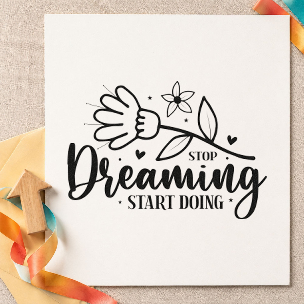 Stop Dreaming Start Doing Flowers craft stamp imprint in black ink on a handmade project, one idea being member kit gift tags.