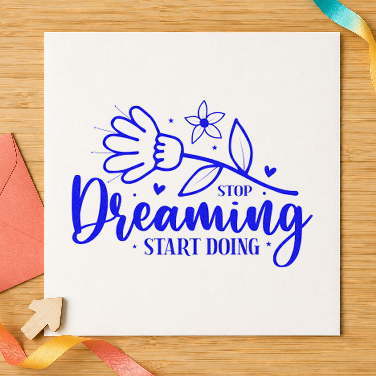 Stop Dreaming Start Doing Flowers craft stamp in blue ink on cardstock, an easy option for shop coat printing.