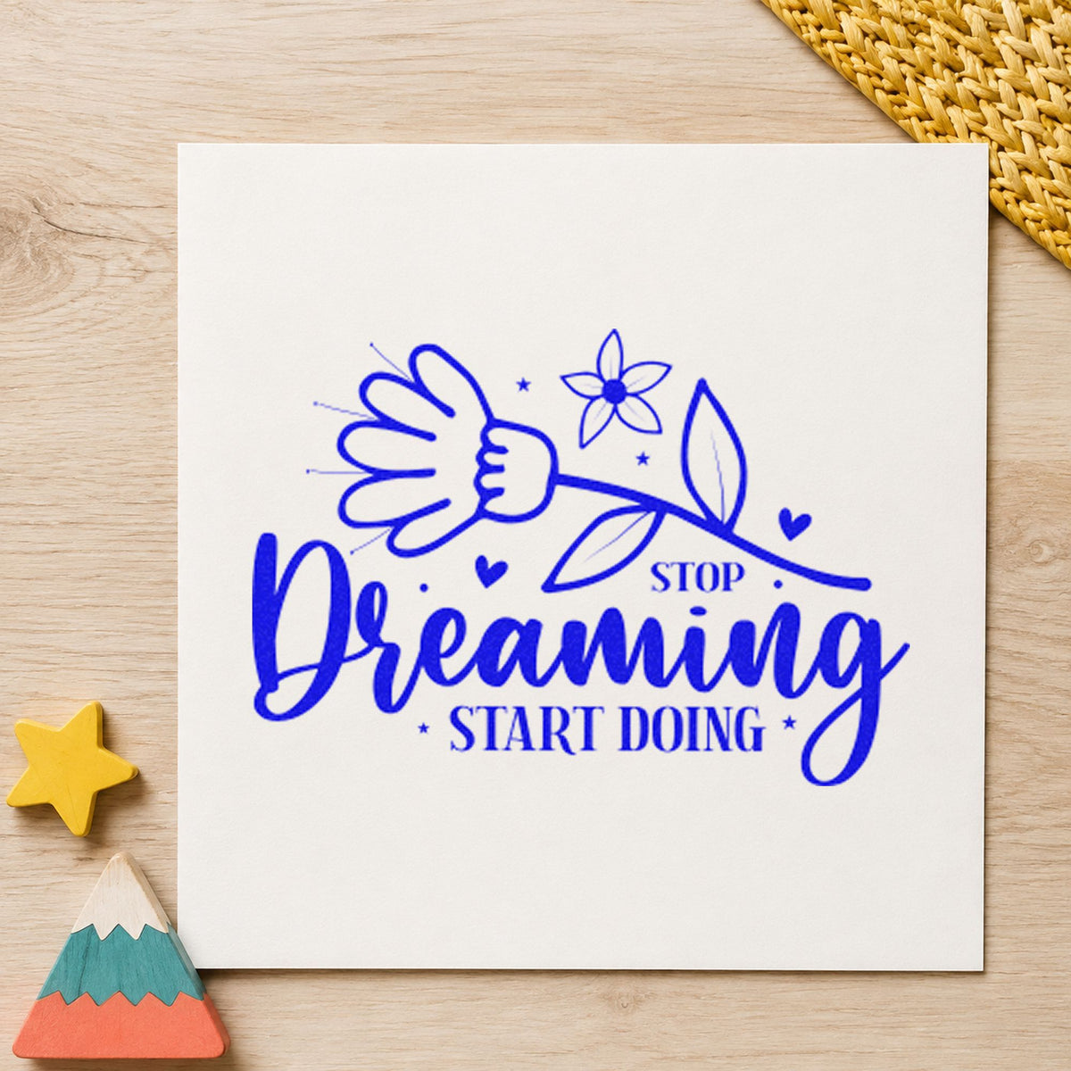 Stop Dreaming Start Doing Flowers craft stamp imprinted in blue ink on paper, a design suited to framed tool wall.