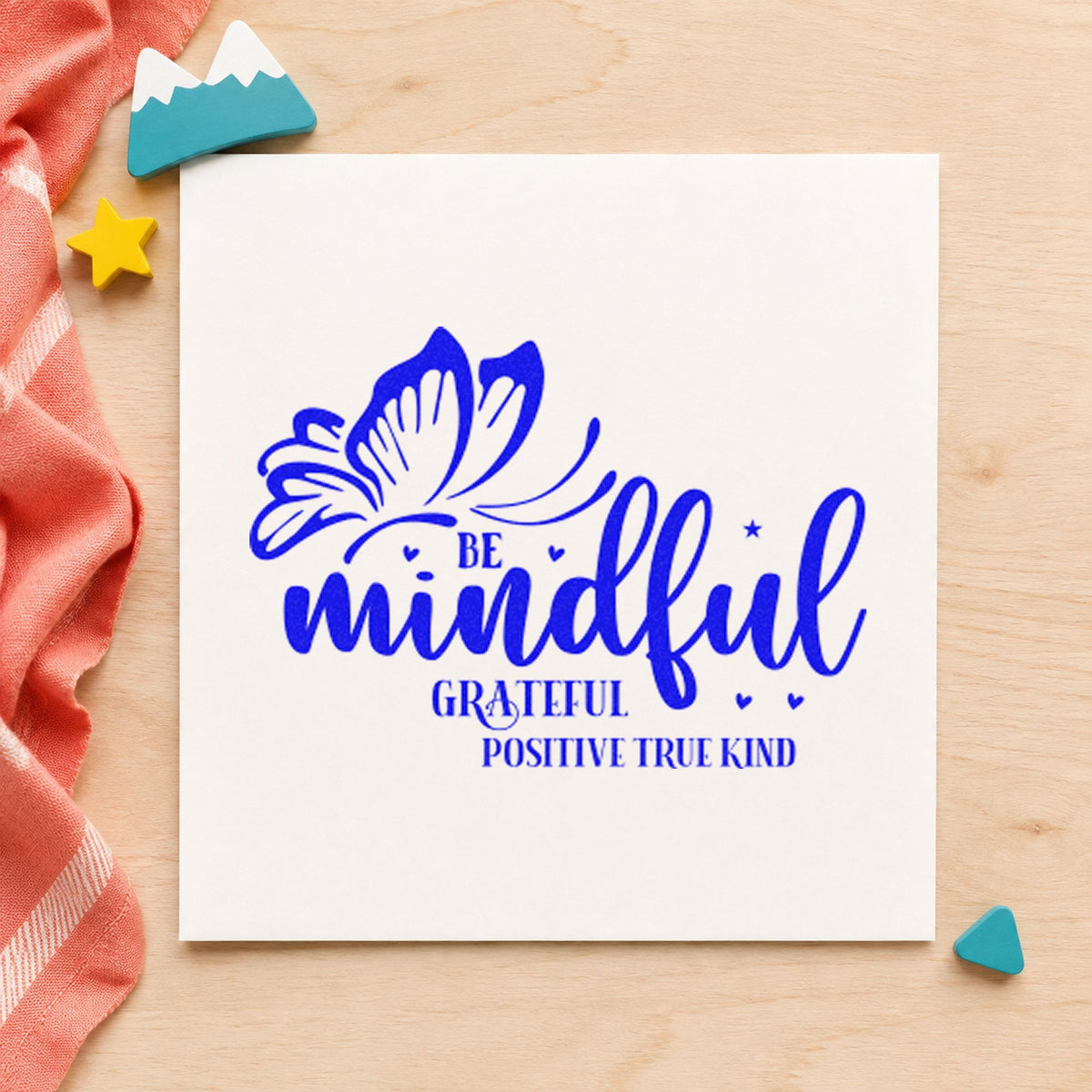 Be Mindful Butterfly Gratitude craft stamp in blue ink on cardstock, an easy option for floor cushion printing.